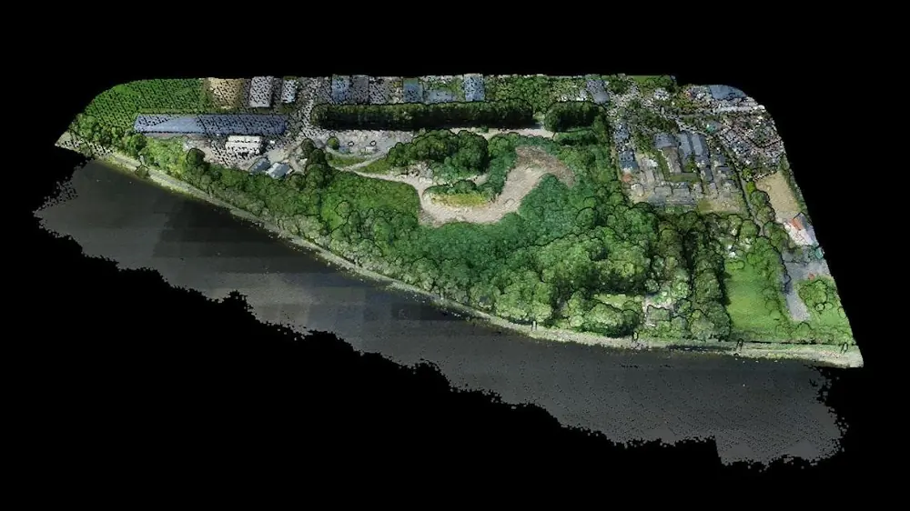 Drone point cloud of the Ouistreham survey with trees, buildings and a beach, before processing