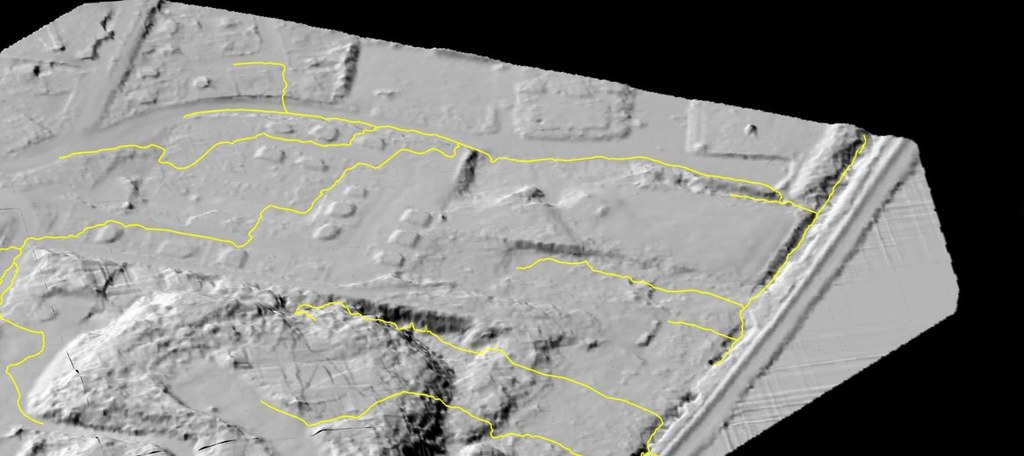 Close-up of drainage axes traced by Lidarvisor along the hillshaded terrain, joining at the outlet